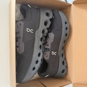 On Running women’s Black and Gray Athletic Shoes